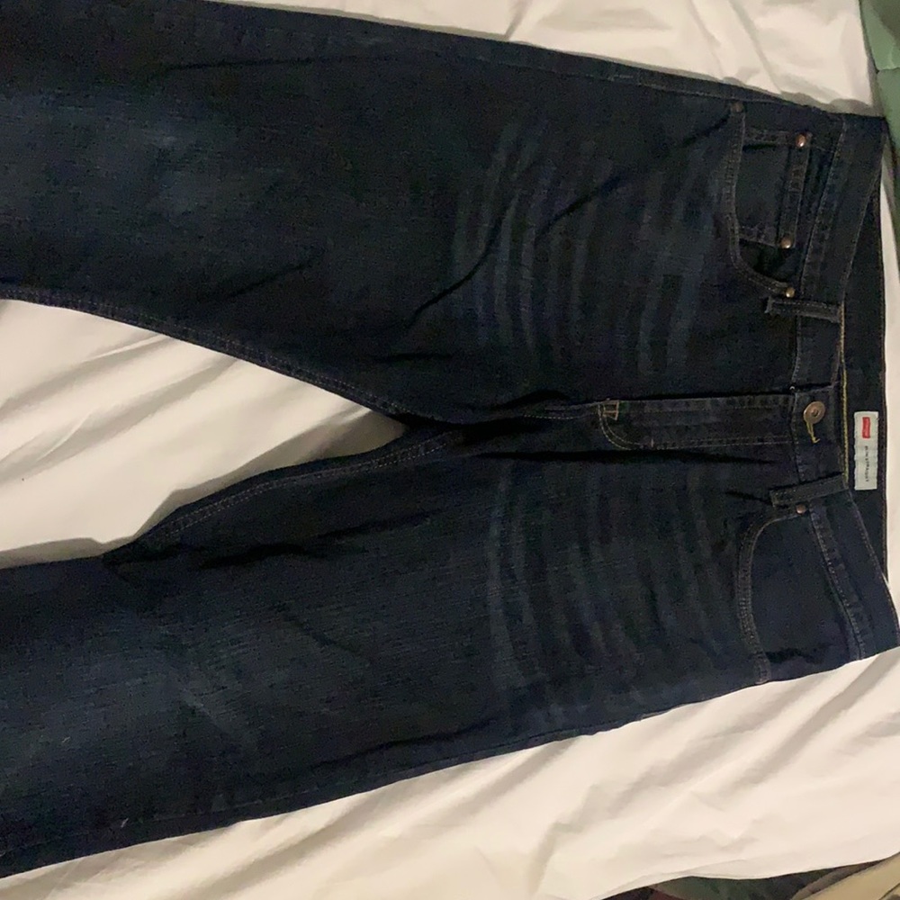 Slim straight wrangler jeans. Dark navy blue